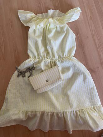 Šaty s kabelkou, 134