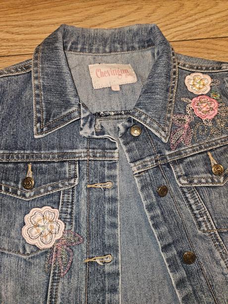 Riflova bundicka s vysivkami, 122