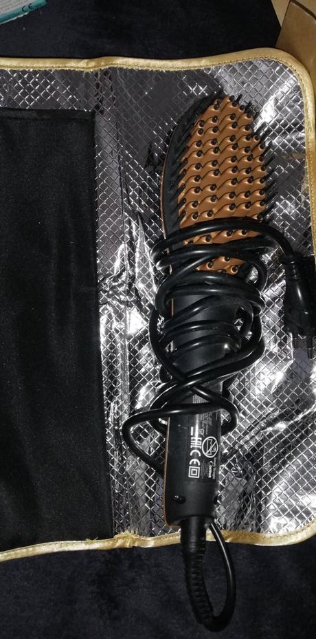 Vyrovnávacia kefa na vlasy, 