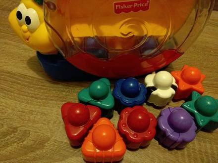 Vkladacka slimak fisher price,