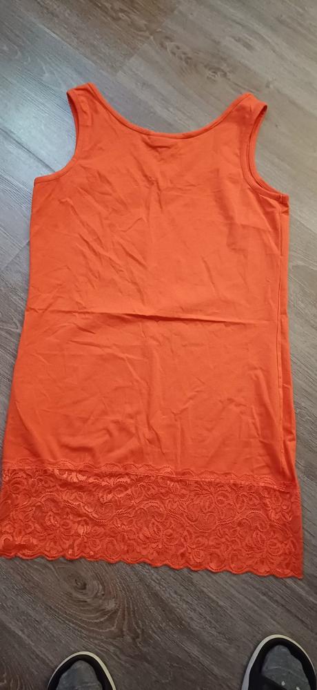 Predĺžené tielko., 40