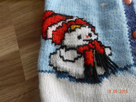 Svetrík so snehuliakmi, 98