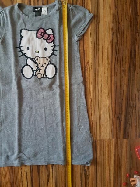 Predlzeny sveter, 122