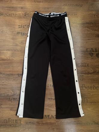 Čierne tepláky s cvokmi, takko,146