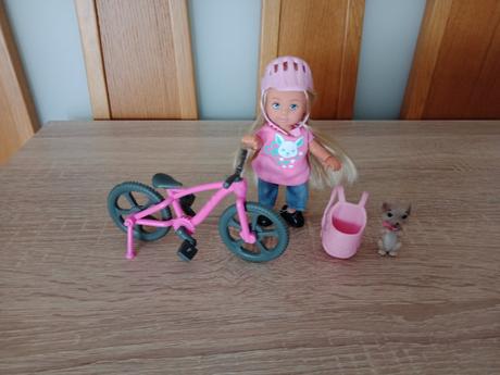 Simba bábika evička s bicyklom a so psíkom, 