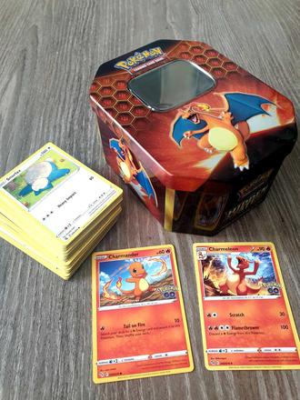 Pokemon charizard kovova krabicka + karty,