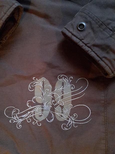 Bunda s vyšivkou, 116