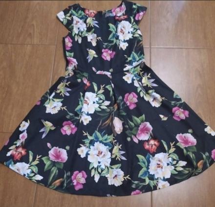 Kvetovane šaty, 38