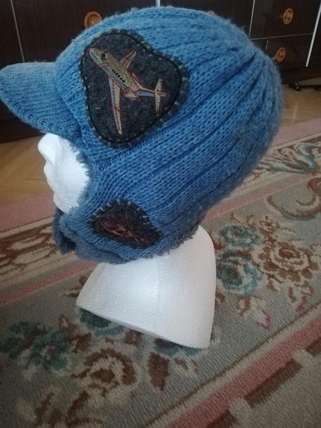 Teplučká čiapka, 128