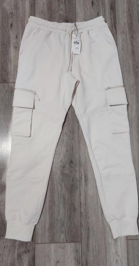 Bledokrémové tepláky, m