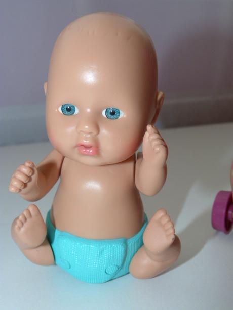 Bábika s kočiarikom (posuvná),