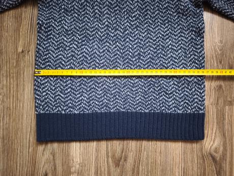 Teplejší sveter, 134