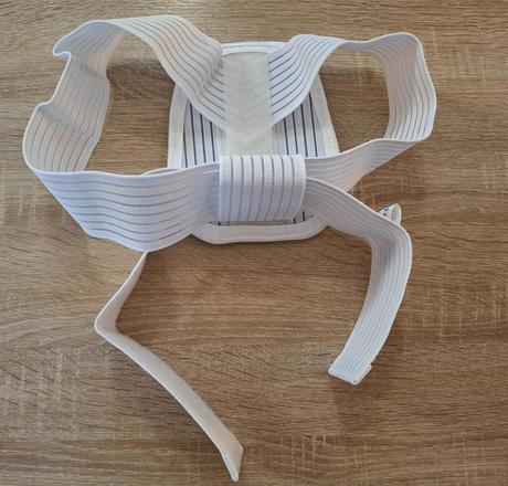 Nová ortopedická pomôcka neoprot, popruh na chrbát,