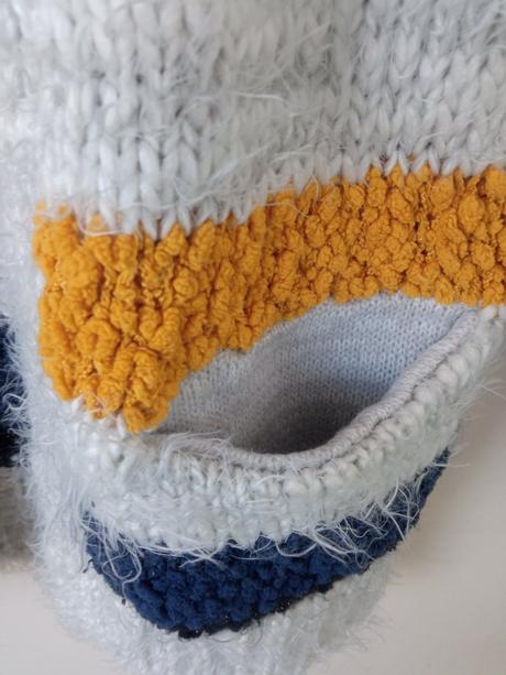 Chlpatý kardigan, 134