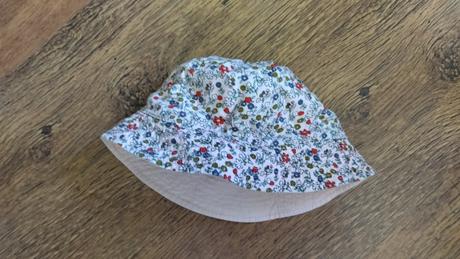 Klobúčik kvetinky, 98