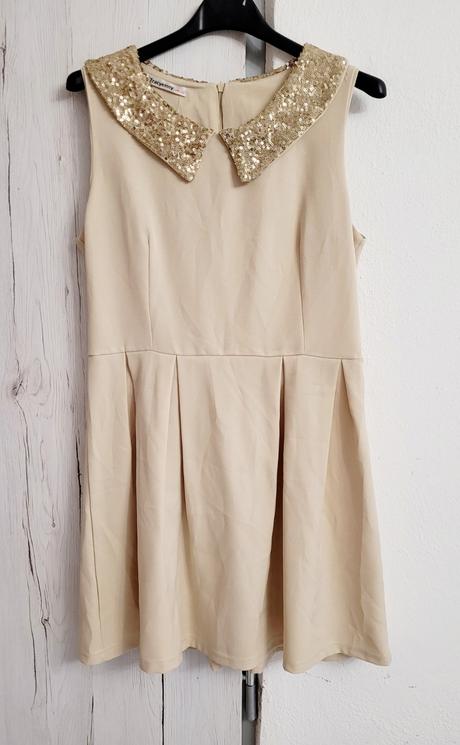 Elegantné šaty s golierom, s