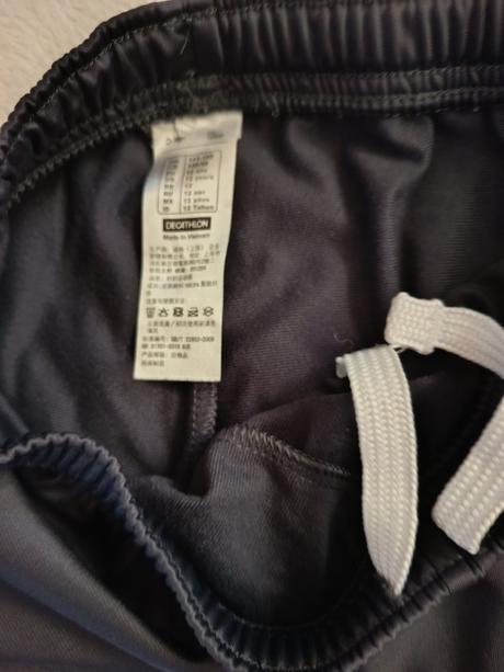 Tepláky, decathlon,140