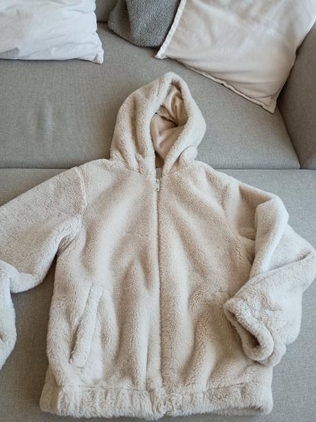 Kožušinová bunda, 158