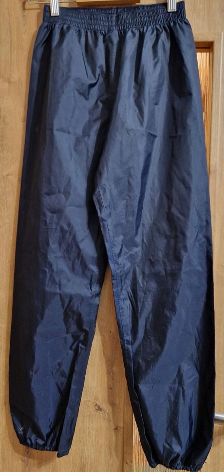 Nohavice do dažďa, decathlon,152