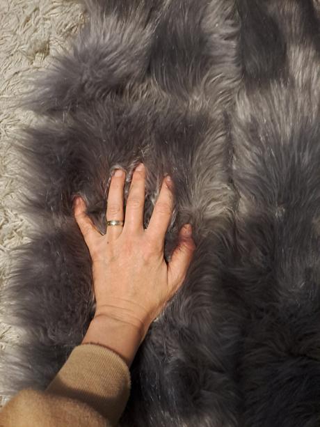 Kozusinkova vesta s kapucnou, 152