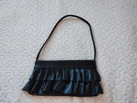 Malá čierna kabelka, 