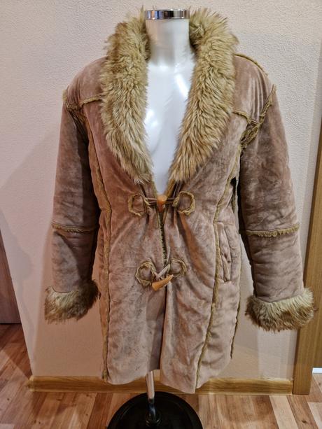 Kozusinkovy kabat, l