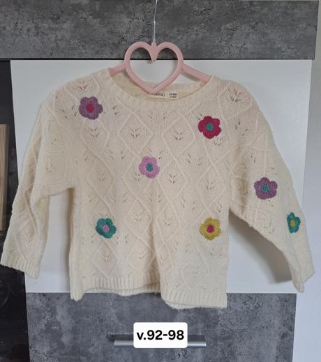 Pulover s kvetmi, 92