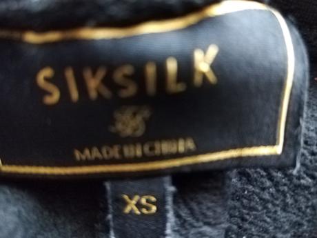 Tepláky zn. siksilk, xs