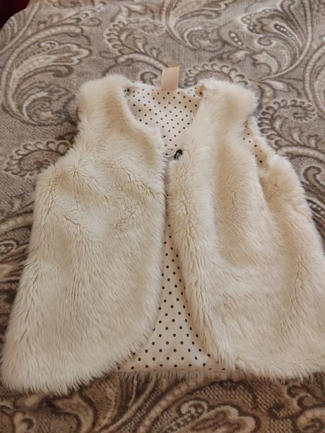 Vestička kožušinka, 98