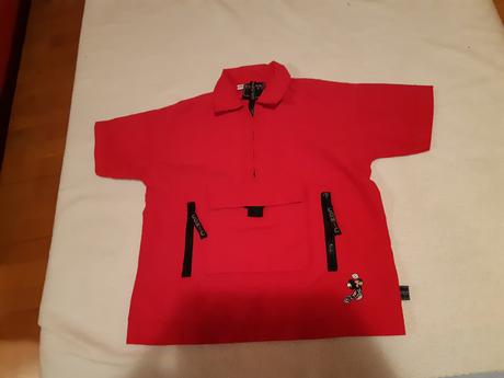 Červená košeľa, 128