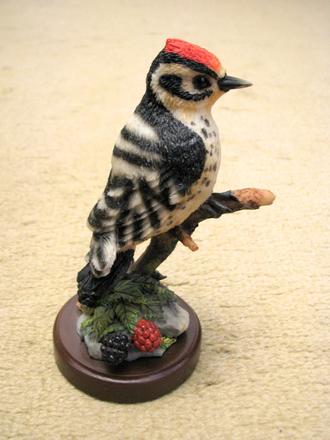 Soška vták - ďateľ,