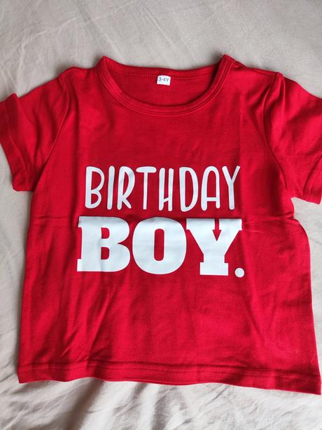 Narodeninové tričko, 98