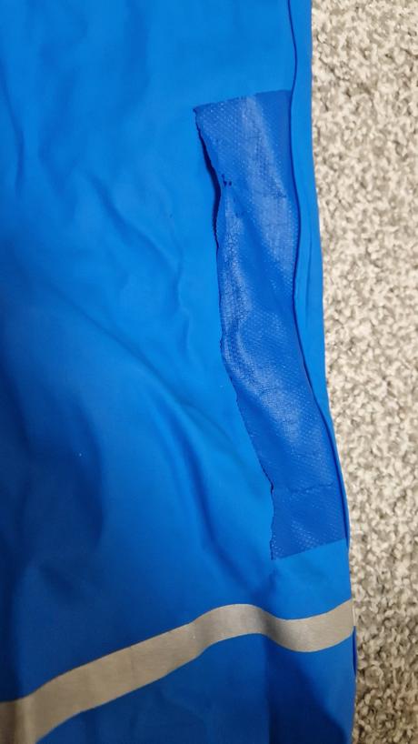 Nohavice do dažďa, lupilu,104