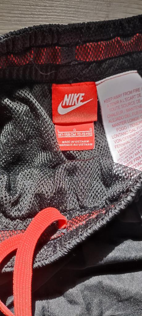 Šustiakové nohavice (športové) nohavice, zn. nike, 146