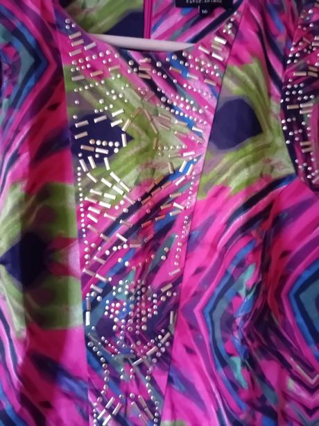 Extravagantne saty s vreckami, 40