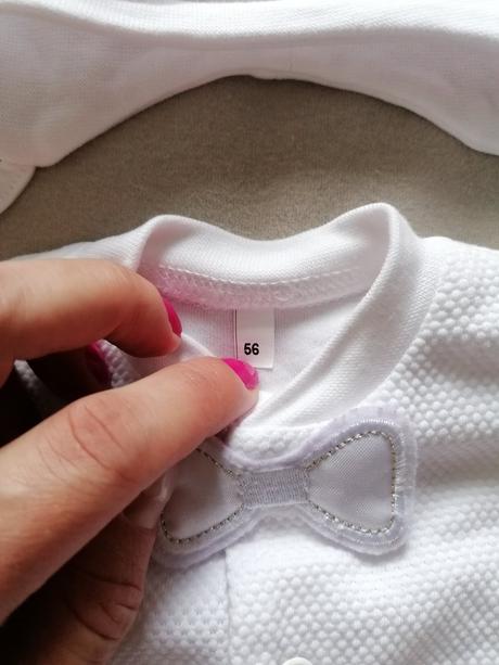 Oblečenie na krst, 56