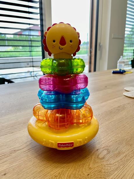 Hudobná navliekačka fisher price,