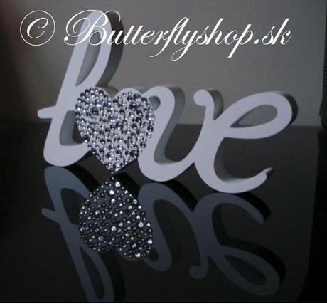 Drevenná dekorácia love,