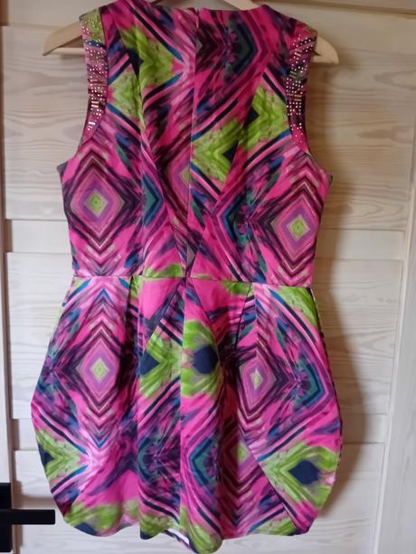 Extravagantne saty s vreckami, 40