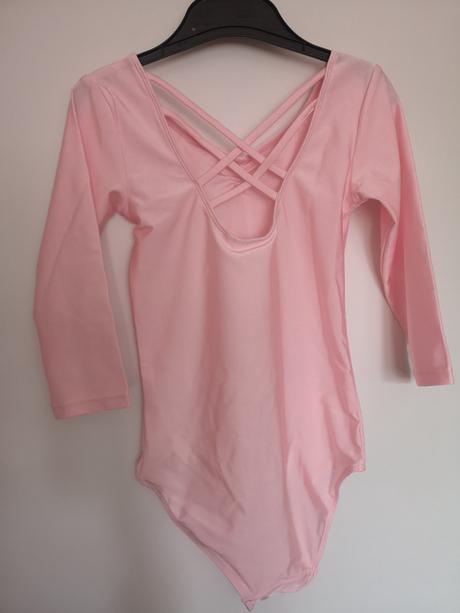 Svetloružový trikot z lesklého džerseja v. 122/128, 122