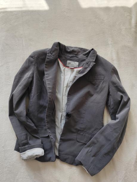 Balík oblečenia zeny, s