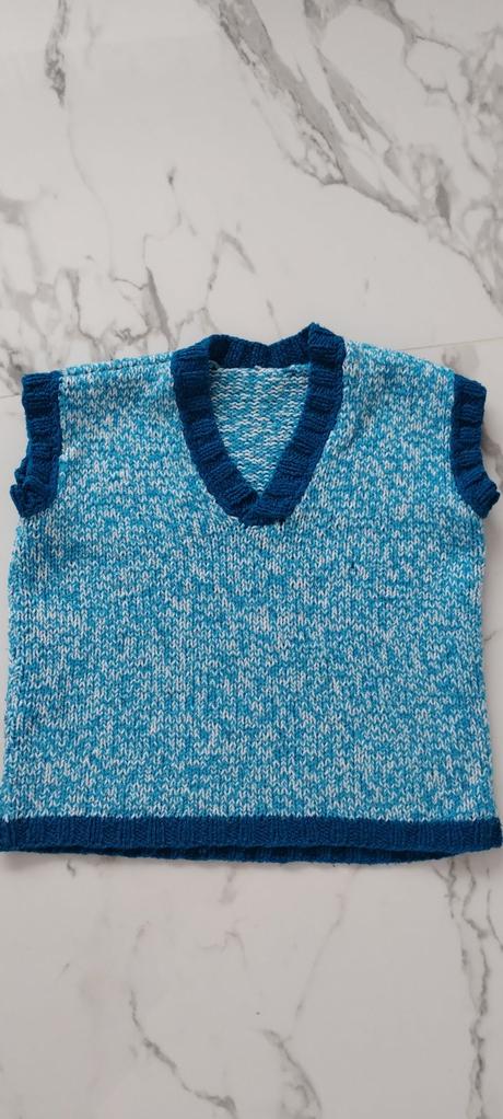 Štrikovaná vesta, 122