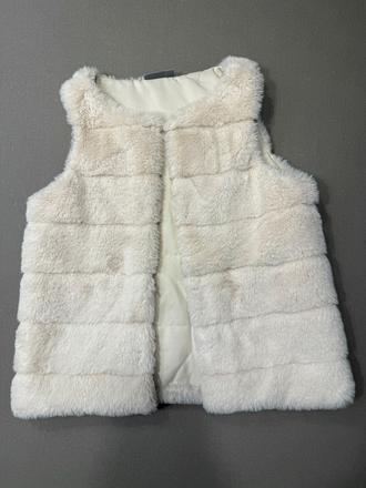 Kožušinová vestička, 134