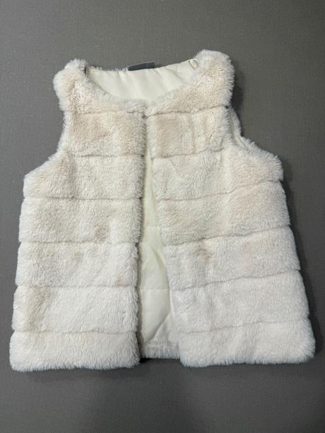 Kožušinová vestička, 134