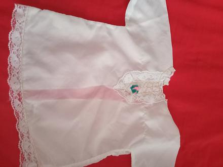 Košieľka ku krstu, 62