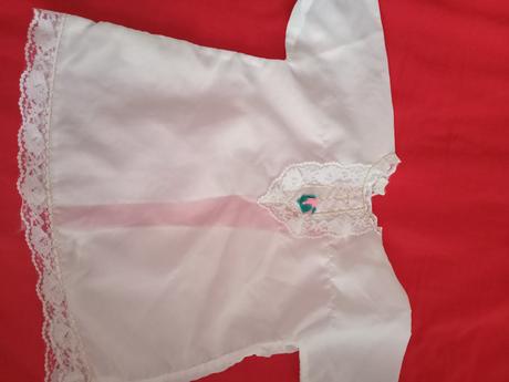 Košieľka ku krstu, 62