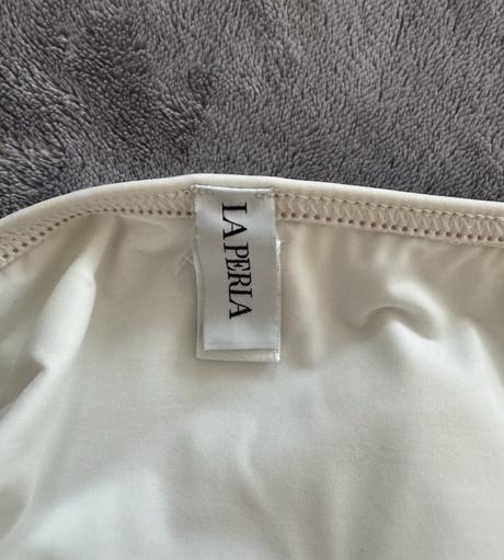 La perla spodok plaviek, s