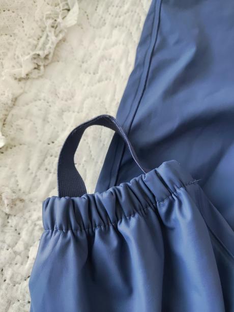 Nohavice do dažďa, lupilu,92