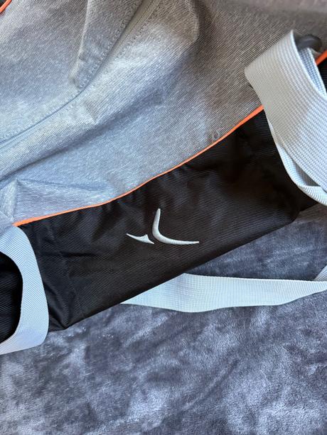 Športová taška, domyos