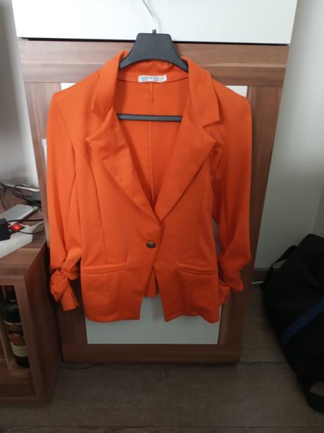 Oranžové sako, 164